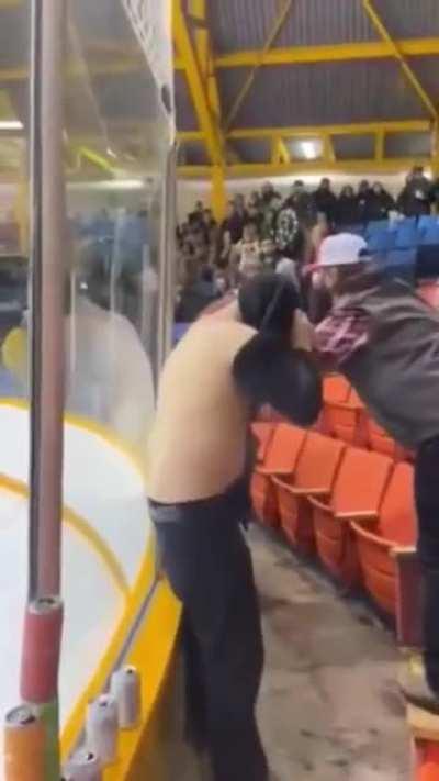 Fight breaks out in the hockey stands. Bonus: KO with a twist.