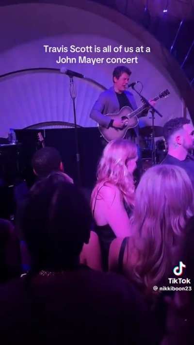 travis scott vibing out at a john mayer concert. 😂