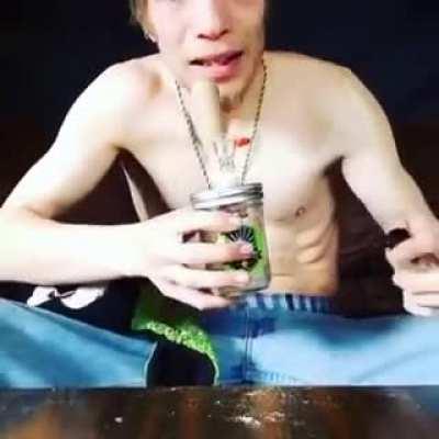 Guy smoking his dandruff NSFL