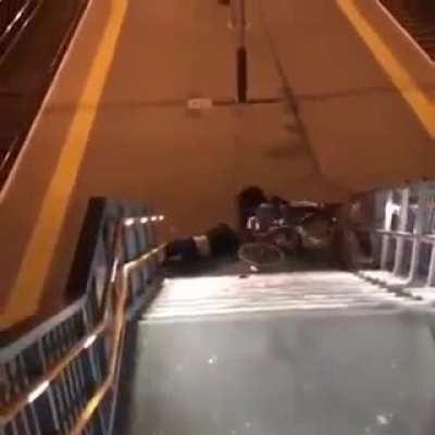 biking down on stairs