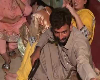 Checking if gun has a round left.... with his left