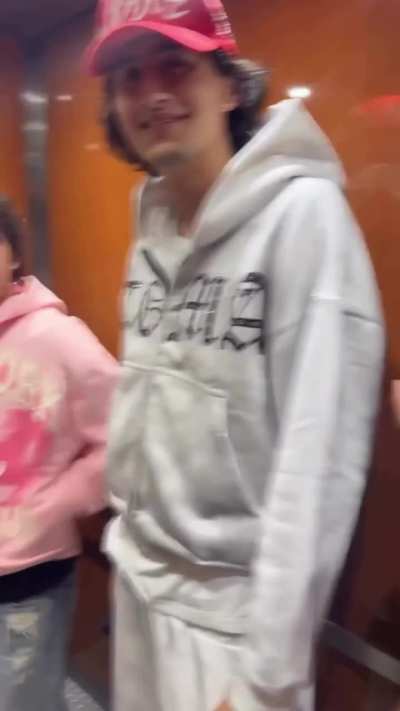 Goodlooking guys on the elevator