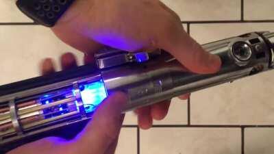 I finally finished my TCSS Graflex with crystal reveal. It's not replica worthy nor does it have a blade or sound, but I'm still happy with it!