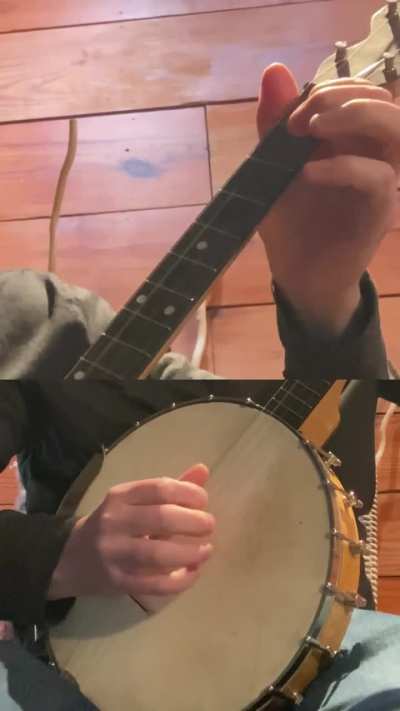 Wynona on a tenor banjo