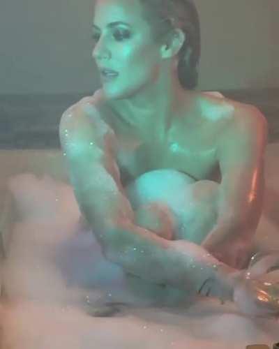 Caroline Flack BTS of a photoshoot.