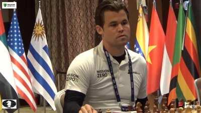 Magnus shaking hands with JOHN CENA