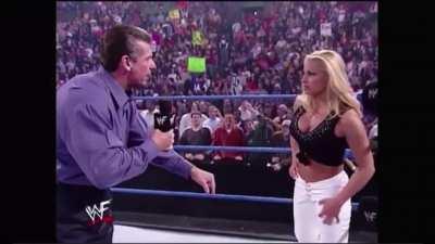 Vince McMahon orders Trish Stratus onto her knees