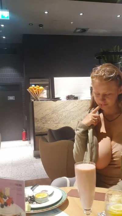 The fact that this waitress was cleaning the table right next to me while I was showing my boobs was very exciting.