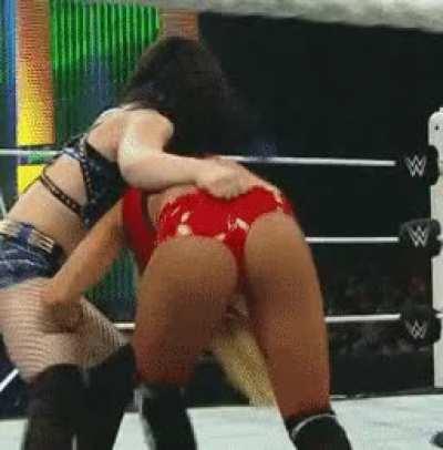 Paige gives Nikki Bella a wedgie
