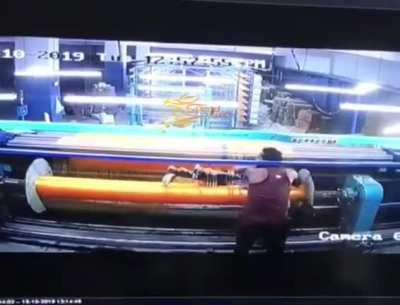 This textile mill worker should have been more careful