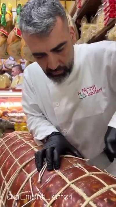 An enormous sausage (120 kg/265 lbs Italian Mortadella)