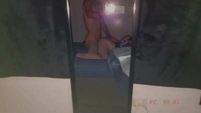 Bending her ove rinfront of the mirror 