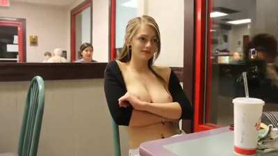 Babe showing her tits in fast food restaurant