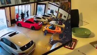 Gang wrecks a car dealership