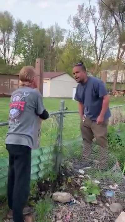 Two neighbors having a fence dispute