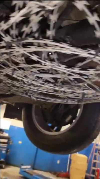 Anti-thief contraption underneath a car