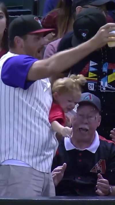 Drops child, catches ball, catches child 