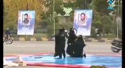 The Islamic Republic has lost its mind. We have disorganized Chadori nunchucks (WTF) with Basijies doing Wheelies in the background while the voice over talks about regaining the trust of the Iranians. (footage from one of IR main TV channels)