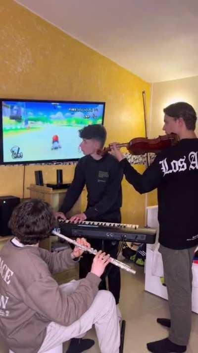 Just guys playing Mario Kart