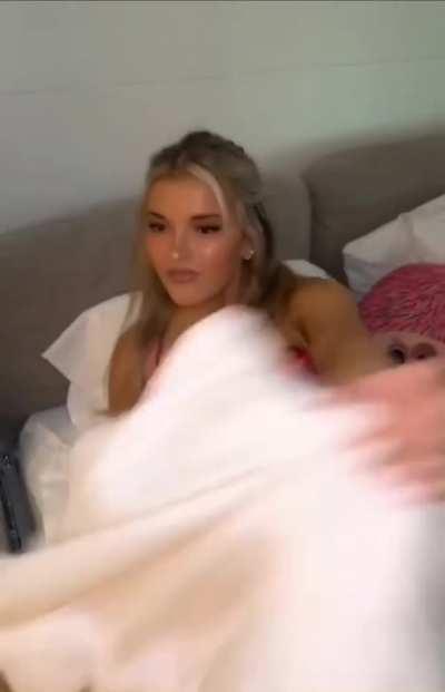 Breckie Hill in a red dress