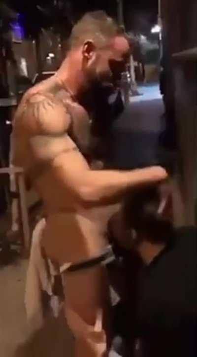 Giving him a blowjob in the middle of the sidewalk.