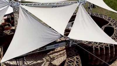 3D printed house from local clay and earth.