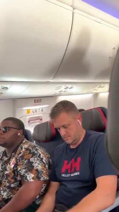 Ignorant hambeast goes wild on what I assume is a Spirit flight