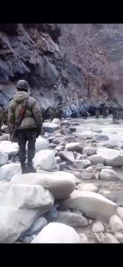 Indian and Chinese soldiers standoff at a river in Ladakh