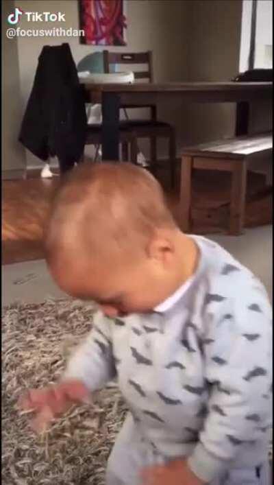 Maori baby learning haka dance