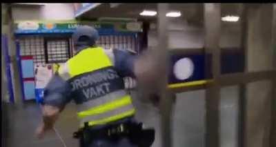 Swedish Robocop takes down two guys