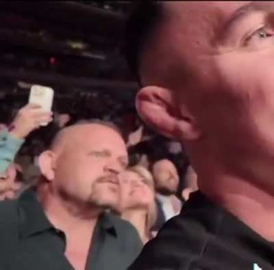 Chuck Lidell Fighting for his darn life behind the Hw Champ