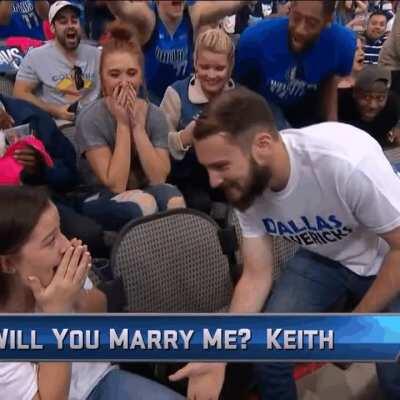 He looks more surprised than her!