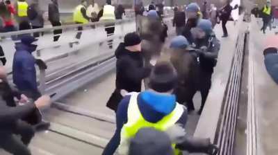 A former French boxer takes on riot police alone during street protests