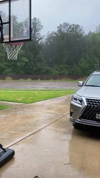 I was alone in the garage, taking a short video of the rain. I didn’t actually watch this video until after a few days later and heard somebody else’s voice. I’m not even sure if this is the right place to post. I just need to try to figure out what it is