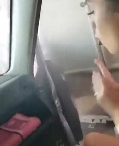 Twerking in a car wash with the door open