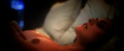 Noémie Merlant close-up nipple teasing