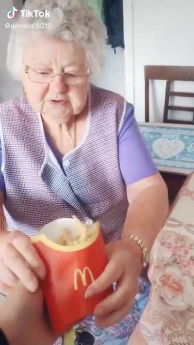 Surprising her grandma with McDonalds fries for the first time since the lockdown.