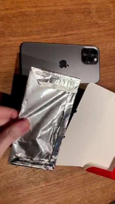 iPhone 12 Pro in Lindt chocolate package