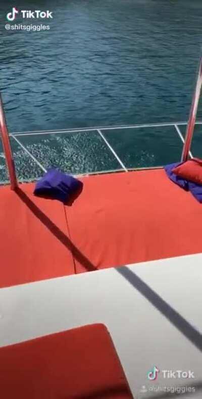 DBS jumping off the boat