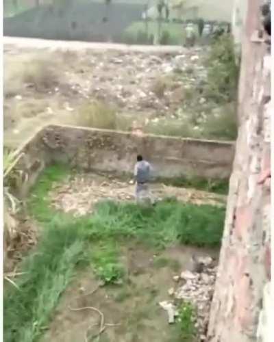 Leopard bulldozing through an Indian village.