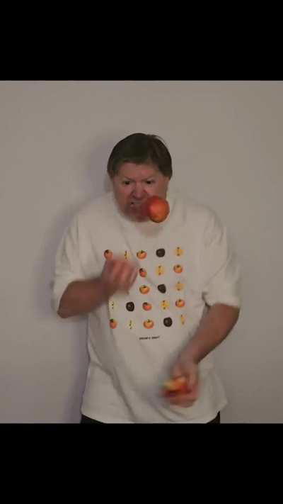 Juggling 3 apples while taking a bite from each of them