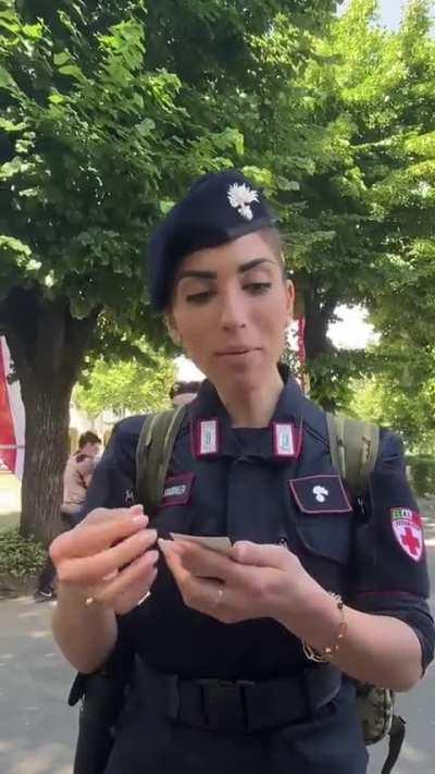 A kind gesture - The way these Italian officers faces light up when they receive a photo
