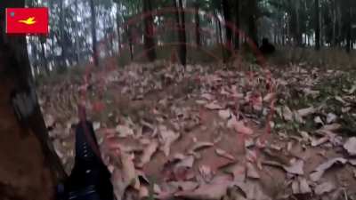 (GoPro/POV) Mon National Liberation Army (Anti-Dictatorship faction) raiding a Myanmar Army checkpoint through a forested area. February 5