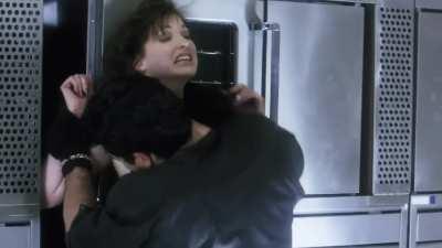 Tina Cote Squeezes a Man’s Balls and Knees Him in the Groin in Mean Guns (1997)