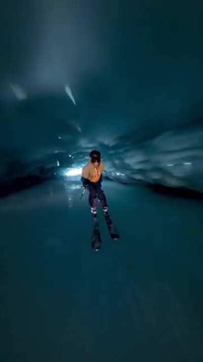 skiing through an ice cave