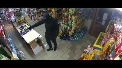 Shopkeeper uses a wet mob to fend off an armed robber