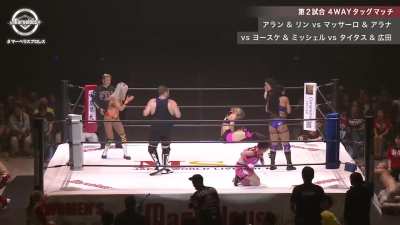 Yosuke Santa Maria and Sakura Hirota in a top rope crotching