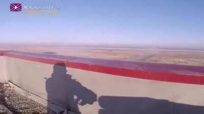 Ukrainian Armed Forces tank shoots Russian separatists at Donetsk Airport. Year 2014