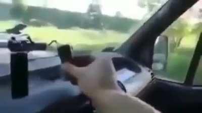 Throwing a lit firecracker out of the car