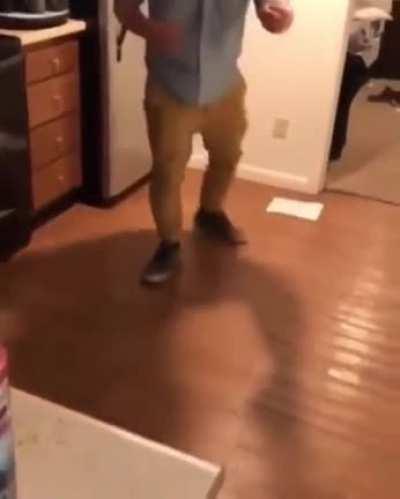 trying to smash a bottle on the floor?